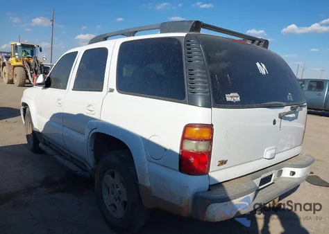 2002 Chevrolet Tahoe Z71 из США, поврежденный, VIN 1GNEK13Z12R221192